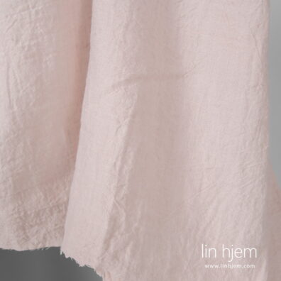 Vasket rosa linstoff, bredt.