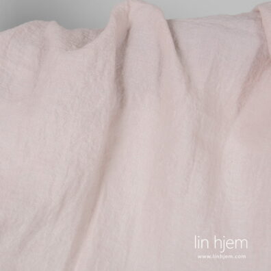 Rosa bredt linstoff, vasket.