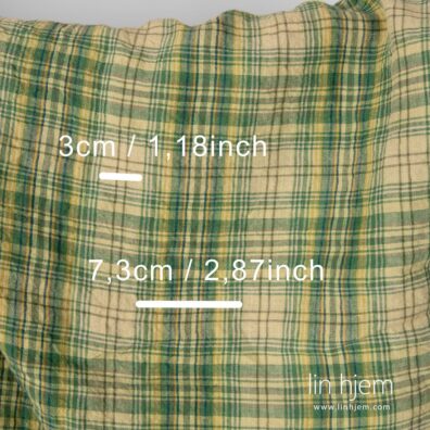 Rutete grønt vasket linstoff, bredt.