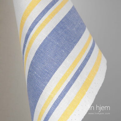 Stripete hvitt stoff i halvlin.