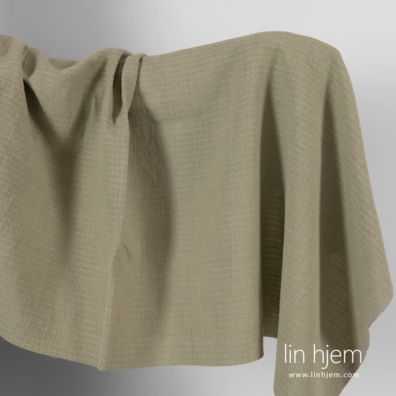 Halvlin vasket grønt stoff i bølgemønster