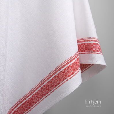 Hvitt/Rødt stripete halvlin stoff.