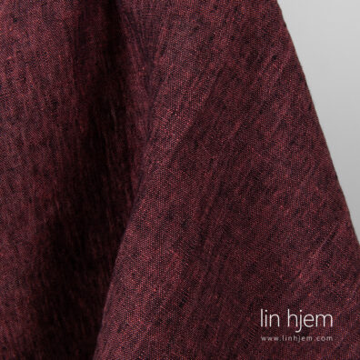 Rødt/svart melange linstoff, vasket.