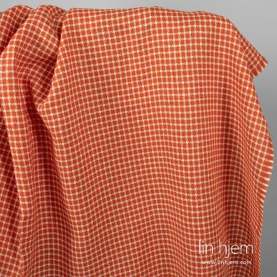 Mønstret rødt linstoff.