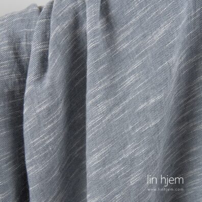 Halvlin vasket stoff i grå farge.