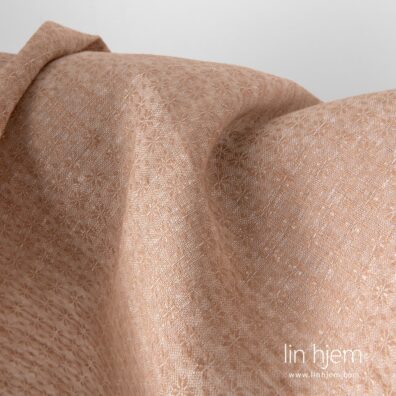 Linstoff i lys brun farge.