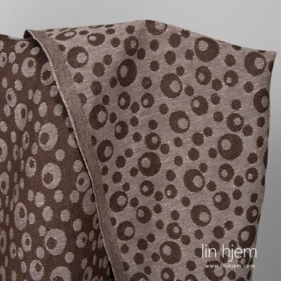 Halvlin stoff med bobler, brunt.