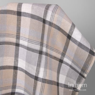 Linstoff i grå ruter.