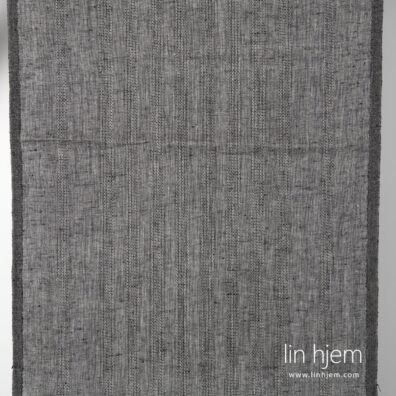 Linstoff i grå svart med gjennomsiktige striper.