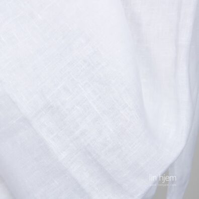 Kritthvitt bredt linstoff.