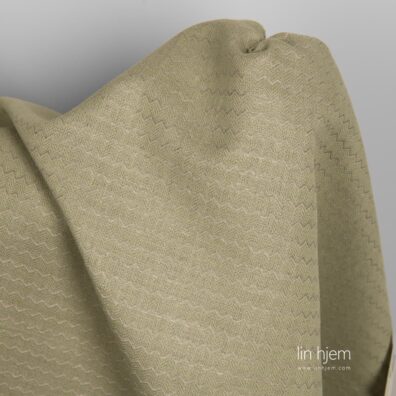 Grønt farget halvlin stoff.