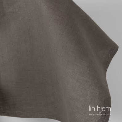 Gråaktig brunt halvlin stoff.