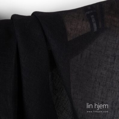 Svart 100% linstoff, gjennomsiktig.