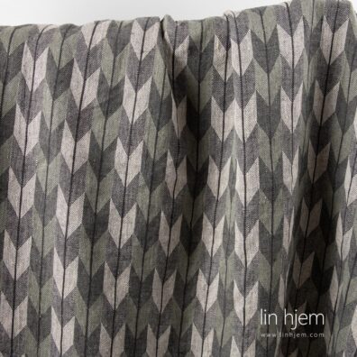 Vasket linstoff i geometrisk mønster.