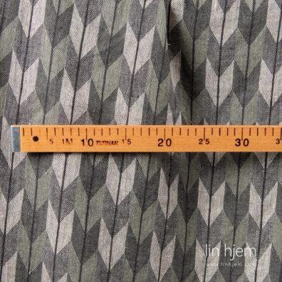 100% linstoff i geometrisk mønster, vasket.