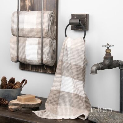 Sand farget håndkle, bingo.