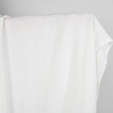 Melkehvitt vasket linstoff