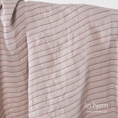 Stipete vasket linstoff i grå farge.