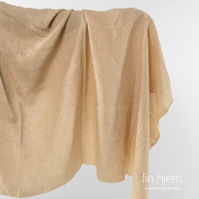 Vasket linstoff med gulaktige striper.