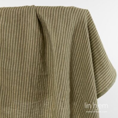 Vasket 100% linstoff i grønn farge.