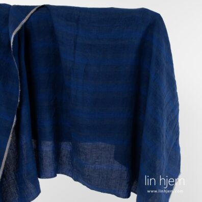 Blått stripete vasket linstoff.