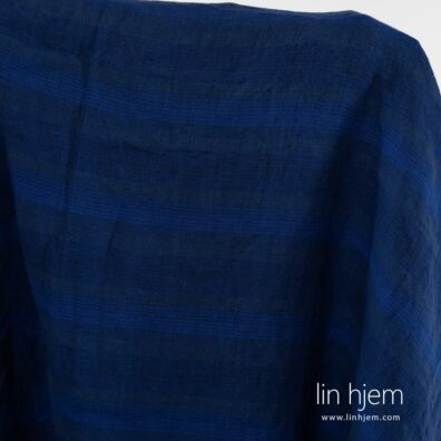 Stripete blått linstoff, vasket.