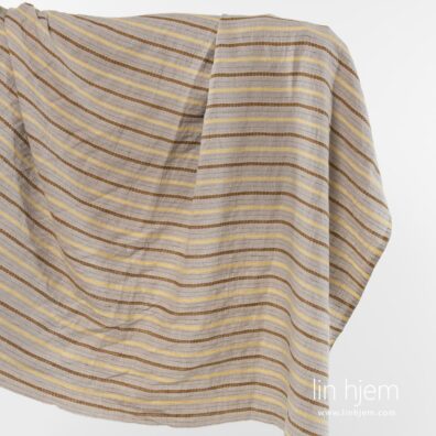 Vasket grått linstoff med striper.