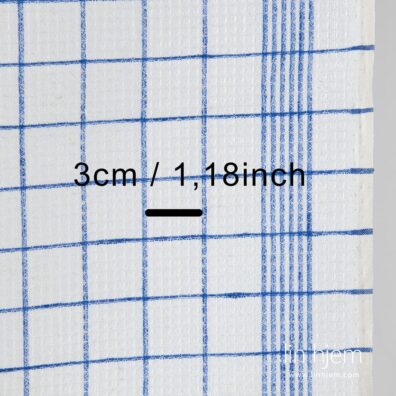 Blå rutete linstoff.