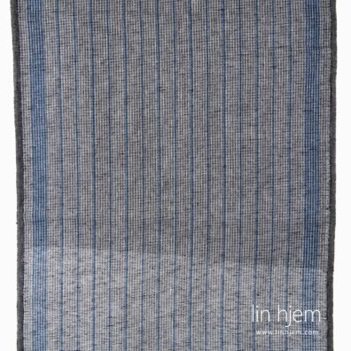 Svart vaffel linstoff med blå striper.