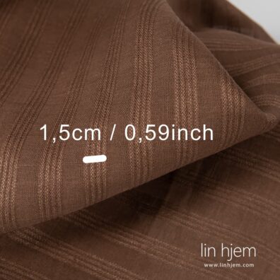 100% linstoff i brun farge.