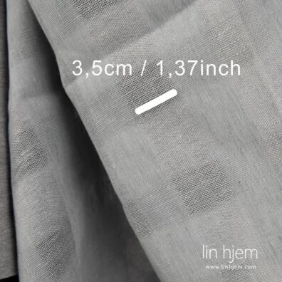 100% linstoff i grå farge, gjennomsiktig.