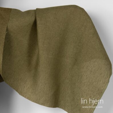 Mønstret grønt linstoff.