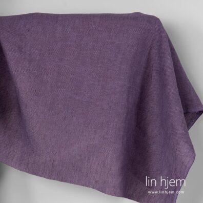 Mønstret lilla linstoff.