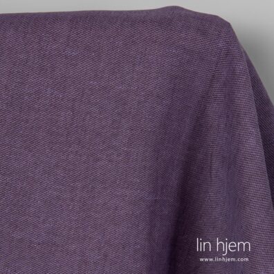 Lilla mønstret linstoff.