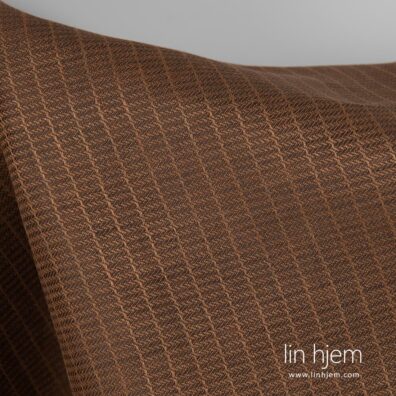 Brunt mønstret linstoff.