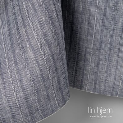 100% linstoff i blåaktig grå farge.