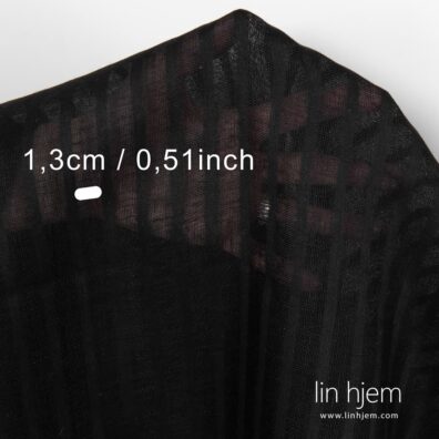 Stripete svart linstoff.