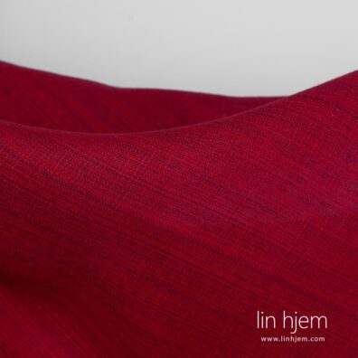 100% linstoff i rød farge.