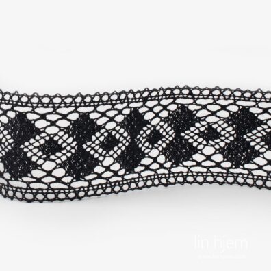 Svart farget blonde i lin.