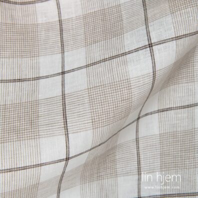 Brunaktig farget linstoff i ruter.