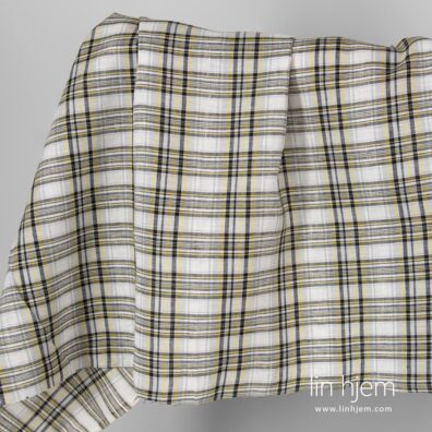 Linstoff i svarte og gule ruter.