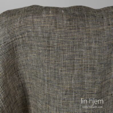 Vasket 100% linstoff i svarte og gule ruter.