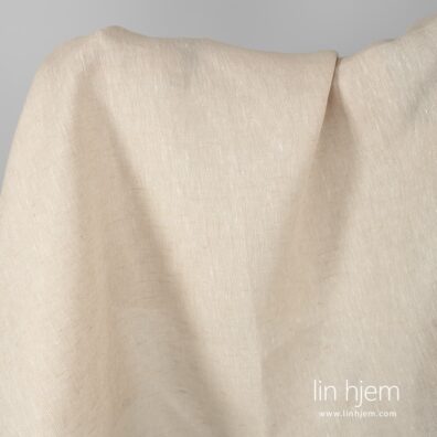 Mønstret beige linstoff.