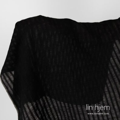 Stripete vasket svart linstoff.