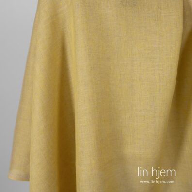 100% linstoff i gul farge.