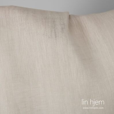 Gulaktig brunt 100% linstoff.