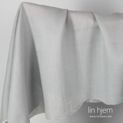 Grått mønstret linstoff.