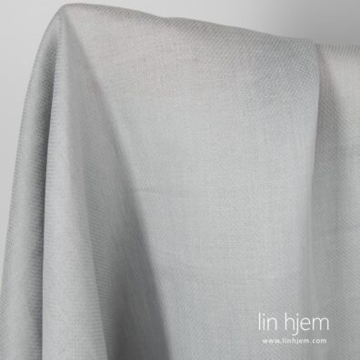 Mønstrer grått linstoff.