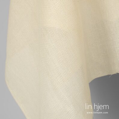 100% linstoff i gulaktig farge.