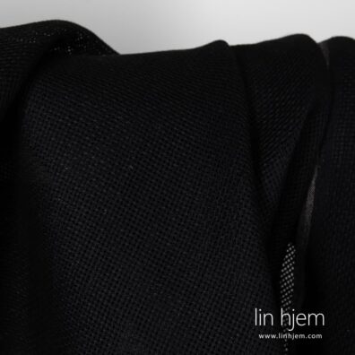 Svart linstoff, gjennomsiktig.